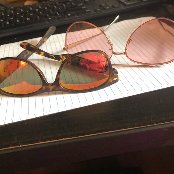 2 pairs of sunglasses. - Picture 2 of 3